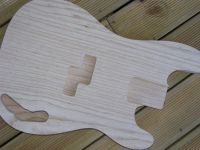 Precision slab bass body, see thru blonde nitro tortie binding&nbsp;&copy;&nbsp;2026&nbsp;42nd Street Guitars
